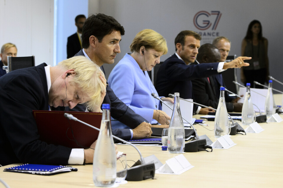 Storbritanniens premiärminister Boris Johnson, närmast i bild, Kanadas premiärminister Justin Trudeau, Tysklands förbundskansler Angela Merkel och Frankrikes president Emmanuel Macron under G7-mötet i Biarritz i slutet av augusti. Arkivbild.