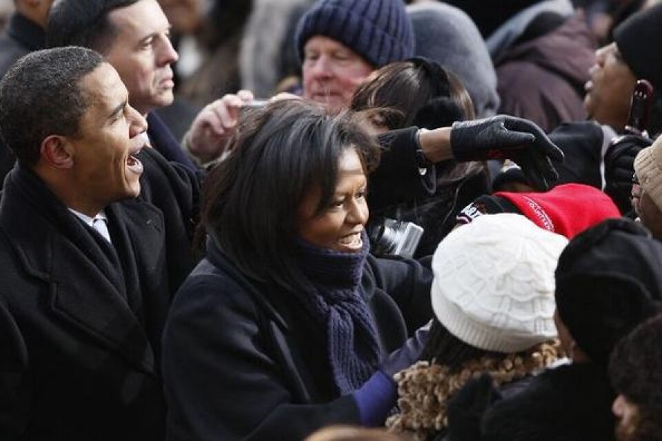 Barack och Michelle Obama i Baltimore på väg till installationen i Vita huset.
