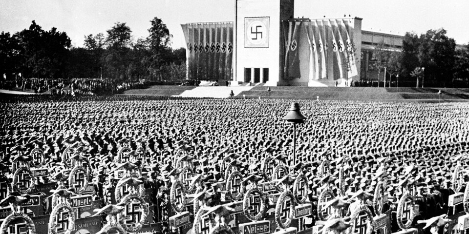 Nuremberg, Germany, Sept. 20, 1936.  The soldiers listened to a speech given by their leader Adolf Hitler.  (AP Photo)