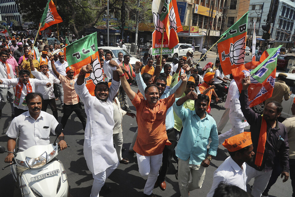 Anhängare till det indiska partiet BJP firar valsegern i veckan. Över 40 procent av de nyinvalda i parlamentet misstänks för brott.