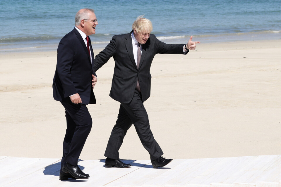 Premiärministrar gånger två: Boris Johnson hälsar på Scott Morrison vid G7-mötet i Cornwall i England i helgen.