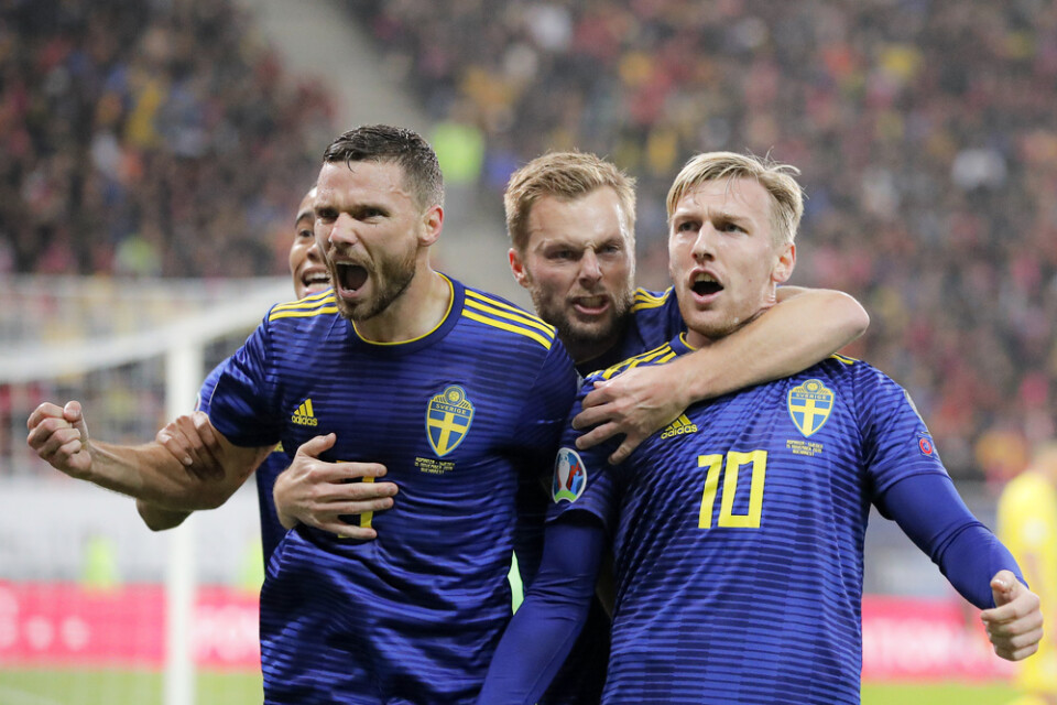 Marcus Berg (vänster) gav Sverige ledningen med 1–0 borta mot Rumänien.