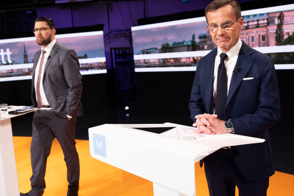 Sverigedemokraternas Jimmie Åkesson och Moderaternas partiledare Ulf Kristersson deltar i en partiledardebatt. Arkivbild.