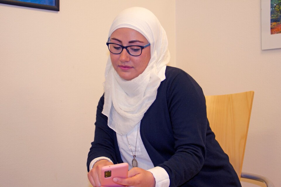 Wesam Alkodmani thinks she spends too much time alone on her smartphone.