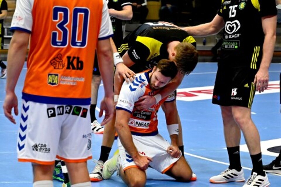 Helge Freiman comforted after a blow to Sävehof.