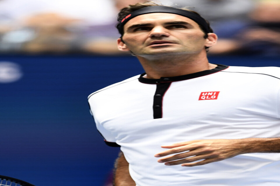 Roger Federer seglar fram i US Open och är klar för kvartsfinal.