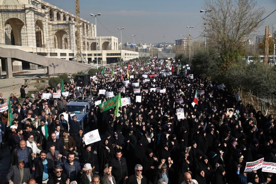 Människor gick ut i protest i Irans huvudstad Teheran den 30 december.