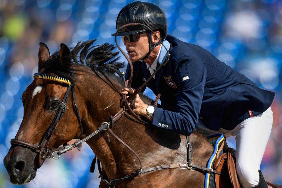 Sveriges Peder Fredricson på hästen Christian K under sin första hoppning i lag och individuell hoppning under ryttar VM i Tyron, USA.