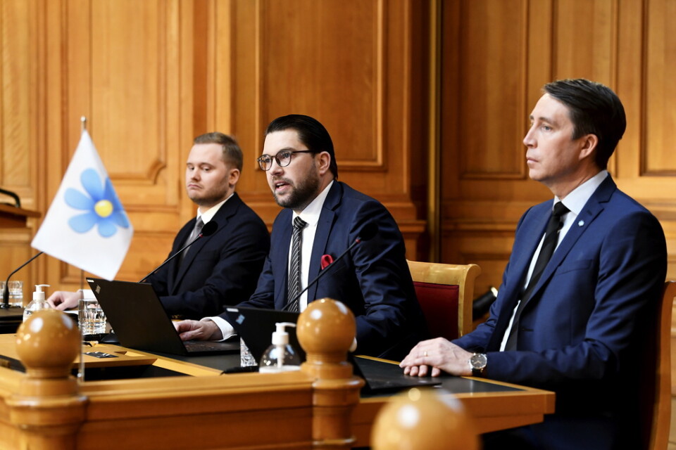 Sverigedemokraternas gruppledare Henrik Vinge, partiledare Jimmie Åkesson och partisekreterare Richard Jomshof i Andrakammarsalen i riksdagen.