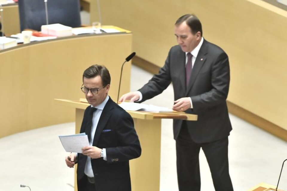 Moderaternas partiledare Ulf Kristersson (M) och statsminister Stefan Löfven (S) under partiledardebatt i riksdagen i Stockholm.