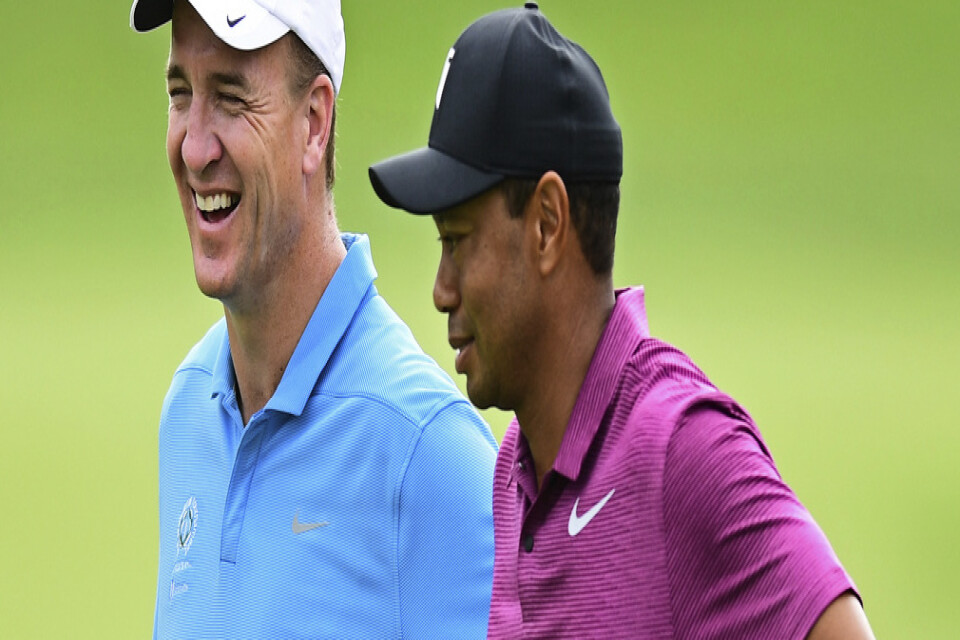 Peyton Manning och Tiger Woods har spelat golf tillsammans tidigare. Arkivbild.