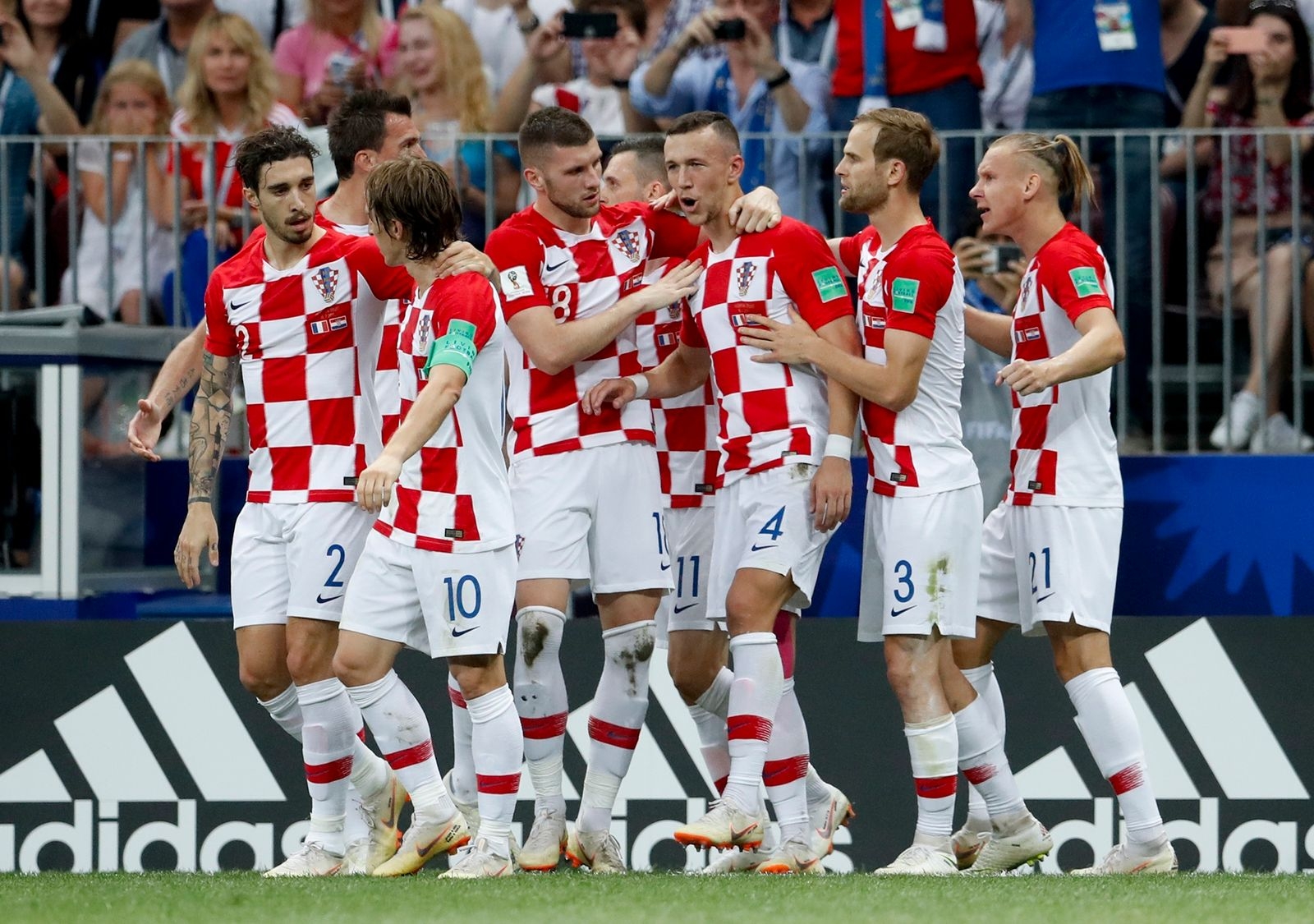 Croatia's Ivan Perisic celebrates with teammates after scoring his side's first goal during the final match between France and Croatia at the 2018 soccer World Cup in the Luzhniki Stadium in Moscow, Russia, Sunday, July 15, 2018. (AP Photo/Petr David Josek)