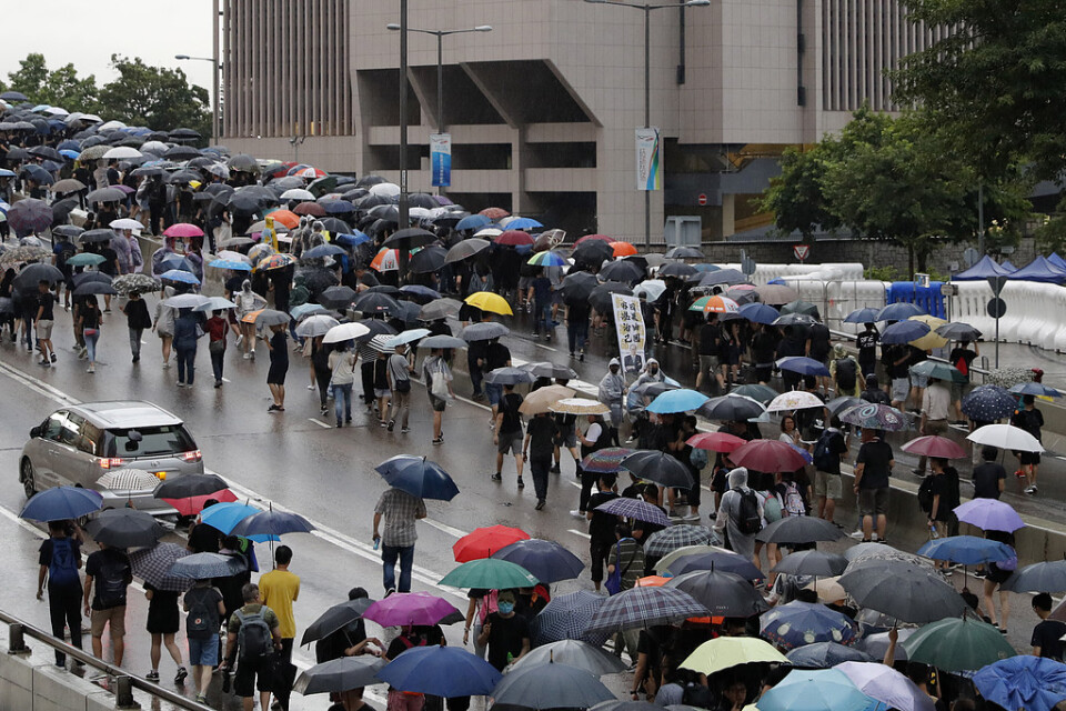 Demonstrationer i regnet i Hongkong i söndags. Arkivbild.