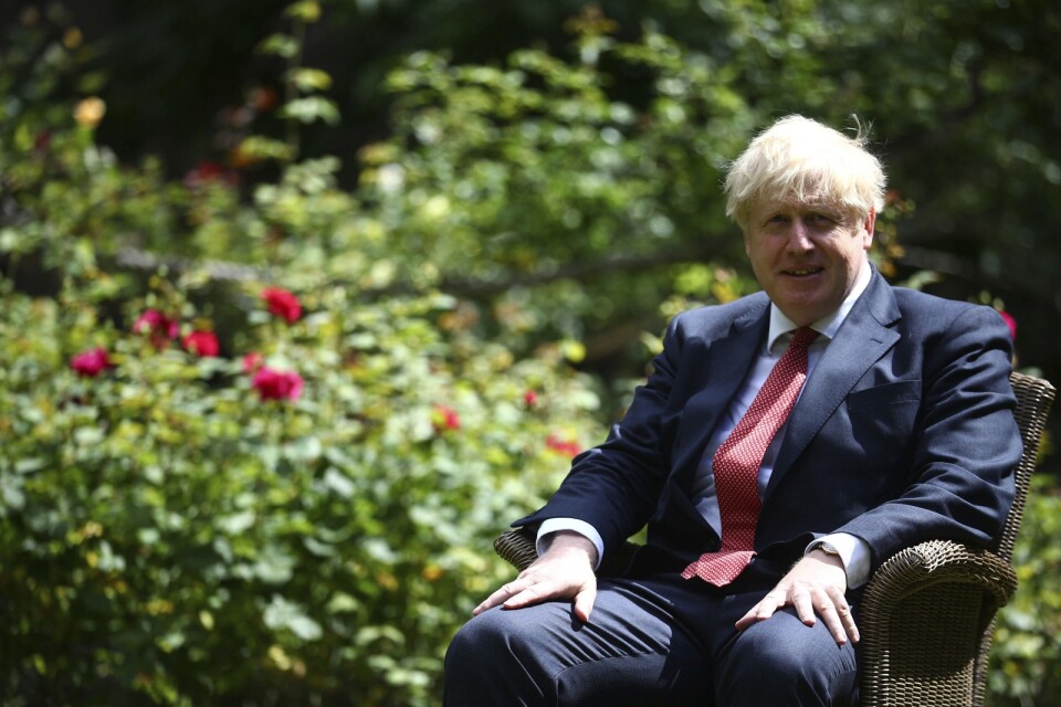 Storbritanniens premiärminister Boris Johnson i väntan på USA:s förre utrikesminister Mike Pompeo i London förra sommaren.
