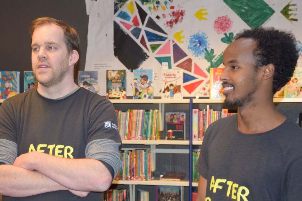 Alexander Magnusson, children's librarian, and Hassan Ali are leaders for After School.