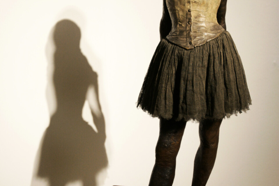 Edgar Degas skulptur "Petite danseuse de quatorze ans". Arkivbild.