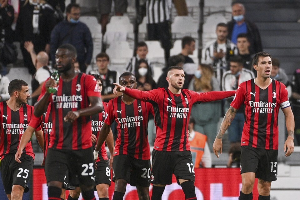 Milans Ante Rebic firar efter sitt kvitteringsmål mot Juventus.
