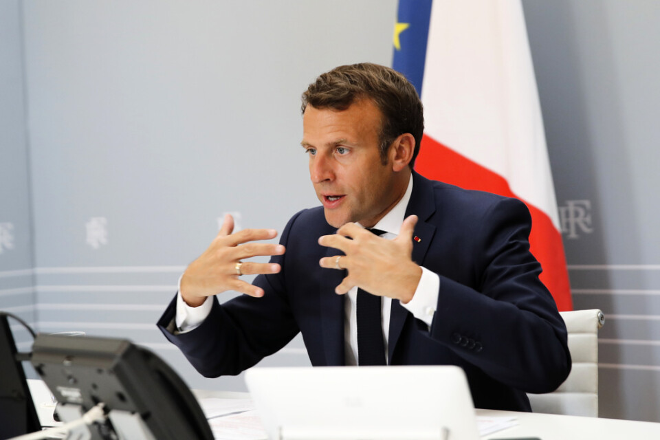 Frankrikes president Emmanuel Macron vid fredagens konferens.