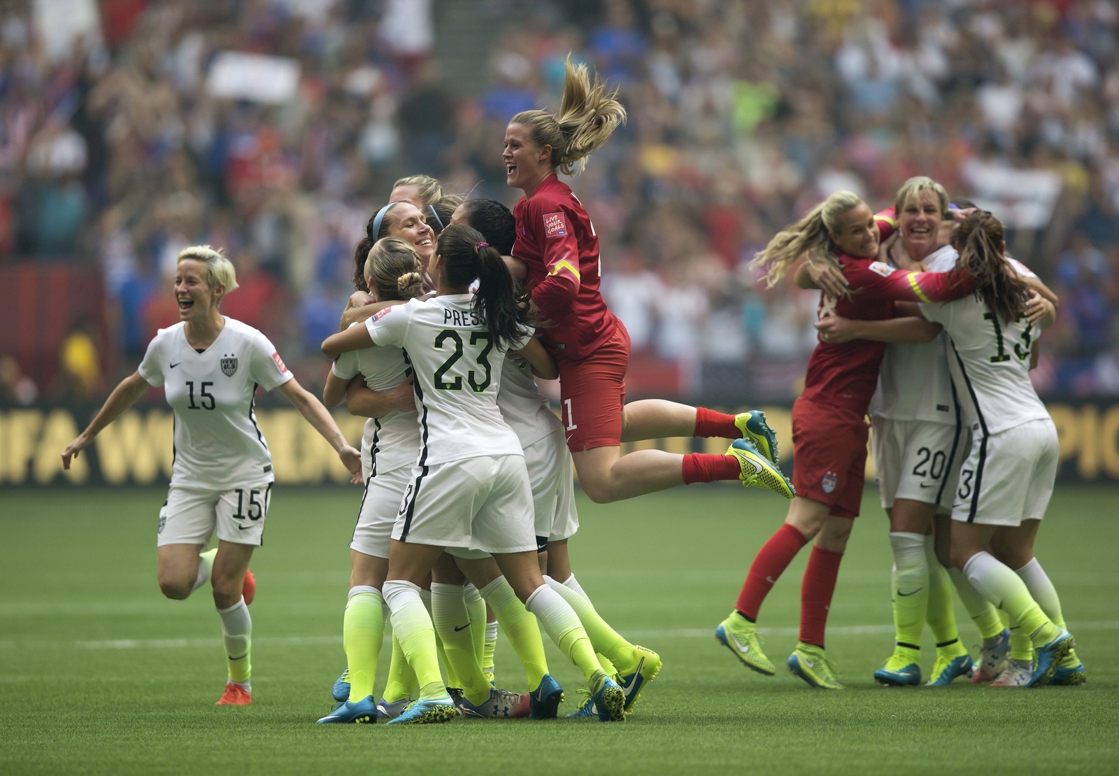 United States players celebrate after they defeated Japan 5-2 in the FIFA Women's World Cup soccer championship in Vancouver, British Columbia, Canada, Sunday, July 5, 2015. (Darryl Dyck/The Canadian Press via AP) MANDATORY CREDIT