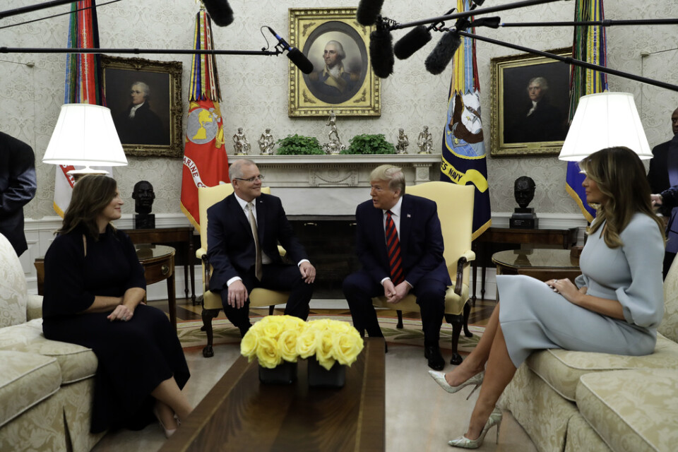 Scott Morrison och Donald Trump flankerade av sina fruar Jenny Morrison och Melania Trump i Vita huset i fredags.