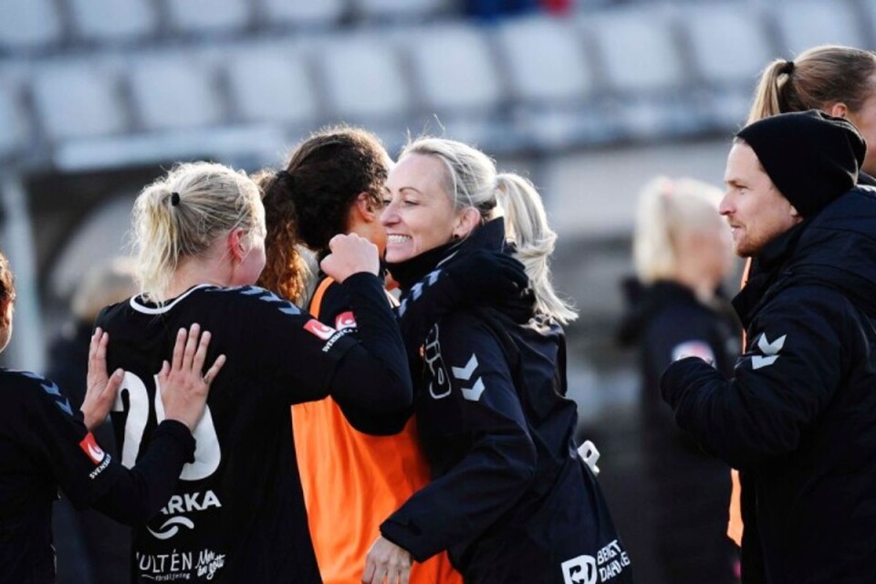 Elizabeth Gunnarsdottir hugs her players. The victory over Uppsala means KDFF is now ready to play in the Champions League next season.