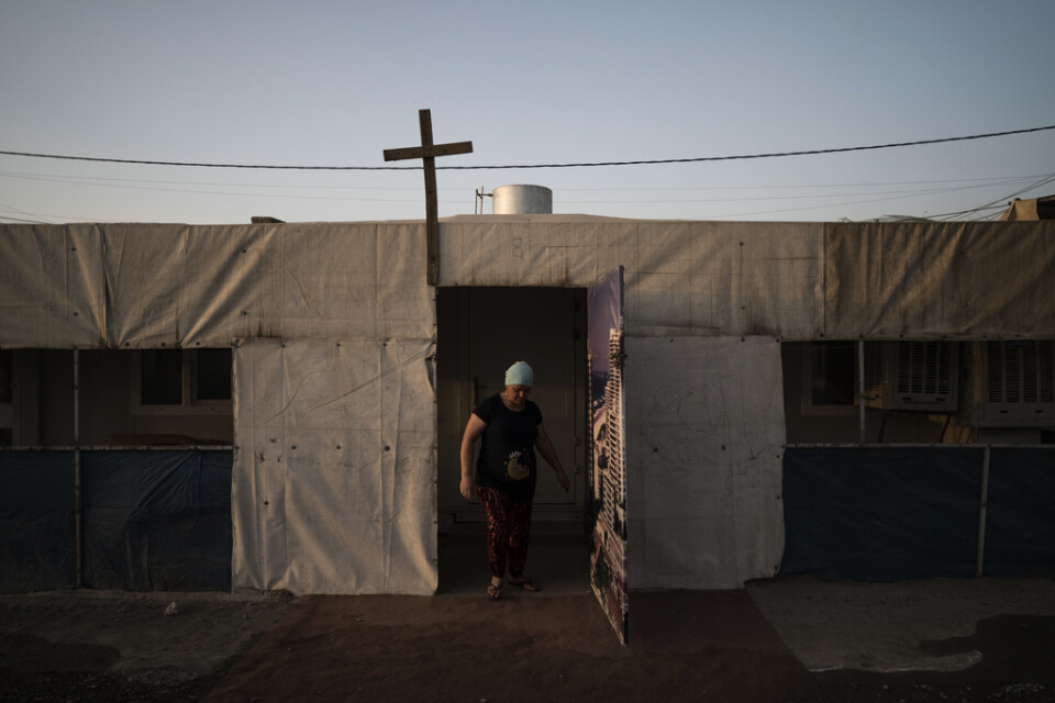 En kvinna i ett läger för kristna flyktingar i Erbil i Irak. Fyra anställda vid en organisation som arbetar för att hjälpa kristna i Irak har försvunnit i Bagdad. Arkivbild
