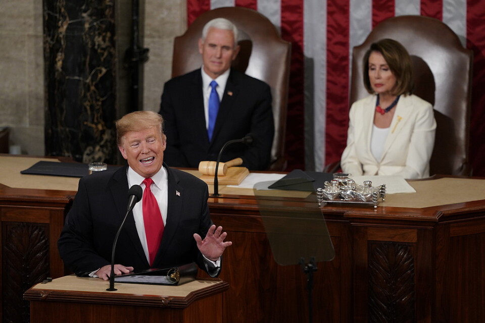 President Donald Trump under sitt tal till nationen. Bakom honom syns vicepresident Mike Pence och talmannen Nancy Pelosi.