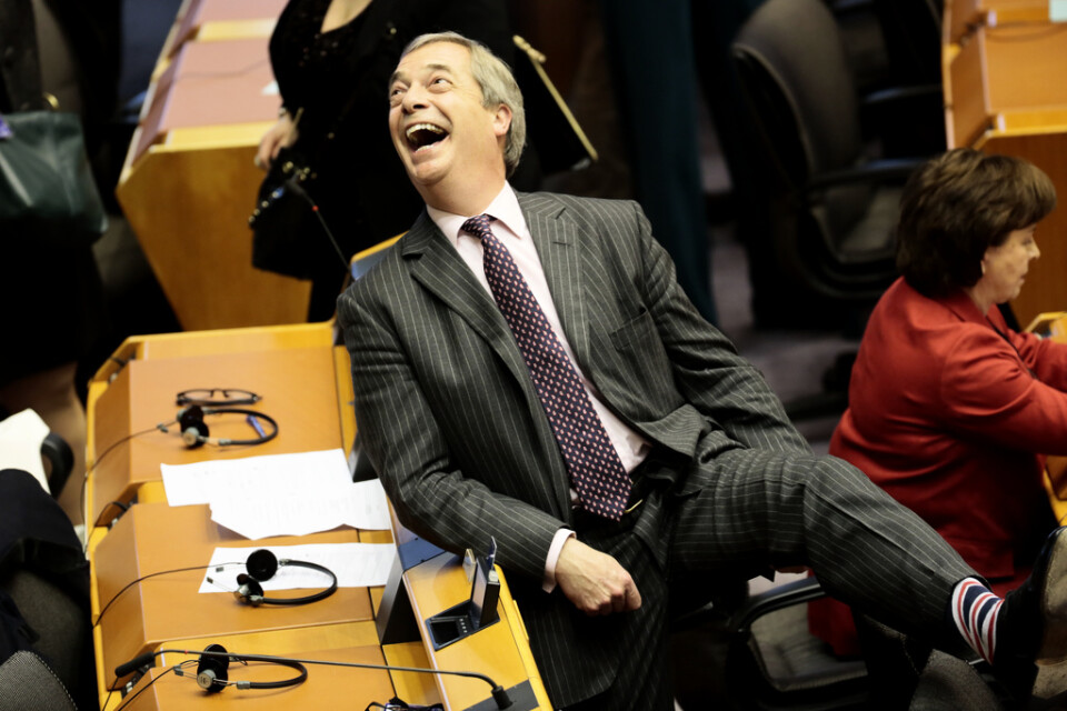 En glad Nigel Farage, EU-parlamentsledamot för Brexitpartiet, inför parlamentets omröstning om brexit.