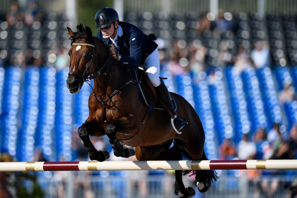 Sveriges Peder Fredricson på hästen Christian K under lagfinalen i dagens hoppning vid ryttar VM i Tryon, USA.